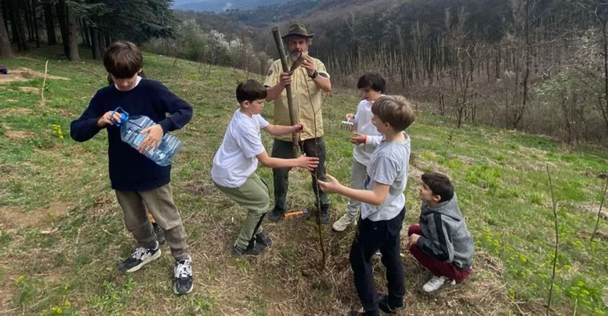 Students celebrate International Forest Day with a geography teacher